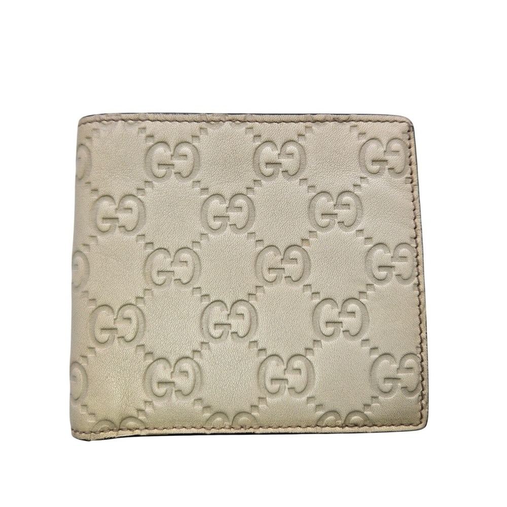 Gucci Cream Embossed GG Leather Bifold Wallet